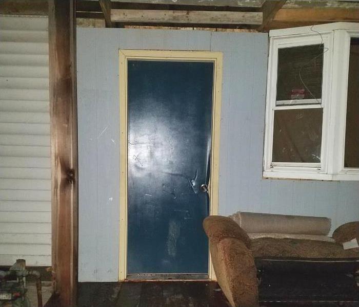 Door damaged by vandalism