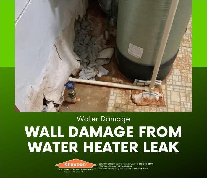 Major damage to wall from a water heater leak.
