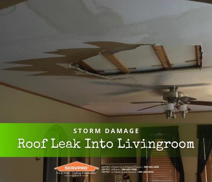 Ceiling damaged from water leaking from roof.