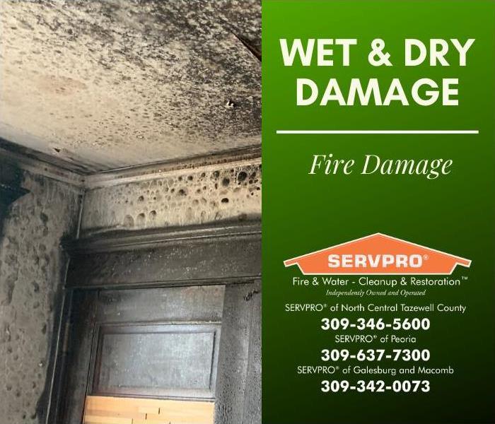 Water, smoke, and heat damage to the walls and the trim of an originally white room.