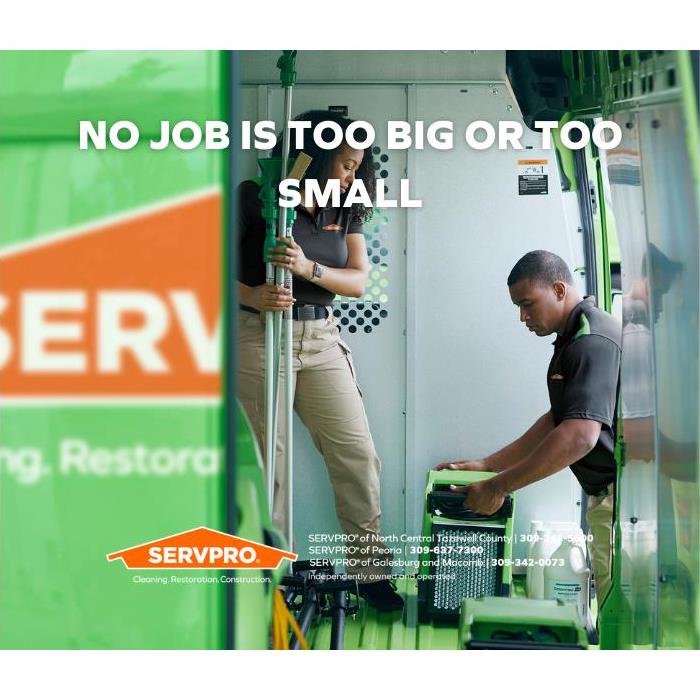 No Job is Too Big or Too Small - SERVPRO technicians in green van